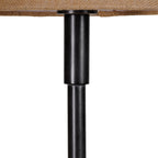 Close-up of a dark lamp stem and cylindrical shade support beneath the woven natural fabric shade.