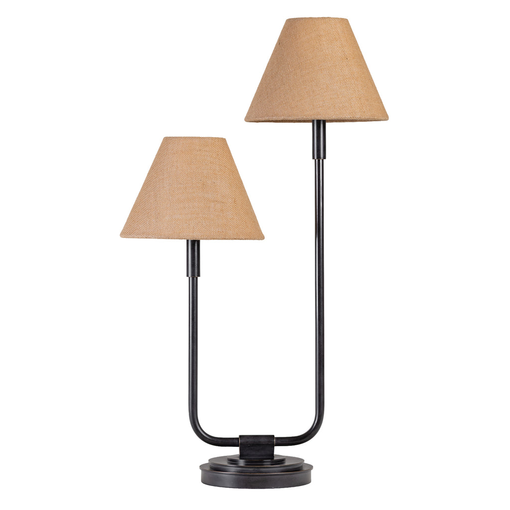 Twin table lamp against a white background, with natural fabric shades at different heights on a dark U-shaped frame and tiered circular base.