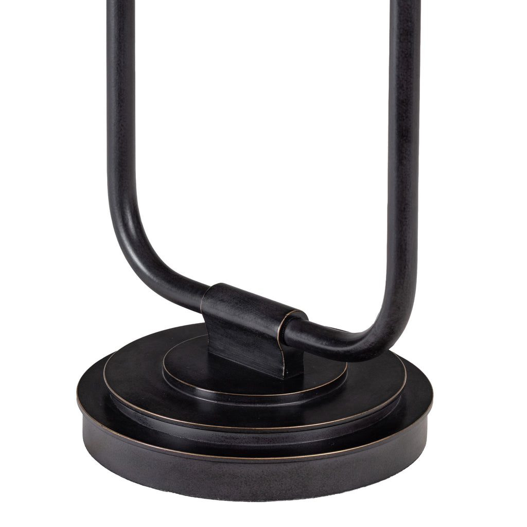 Close-up of the lamp's curved lower frame and tiered circular base, showing the dark finish and fine golden edges.