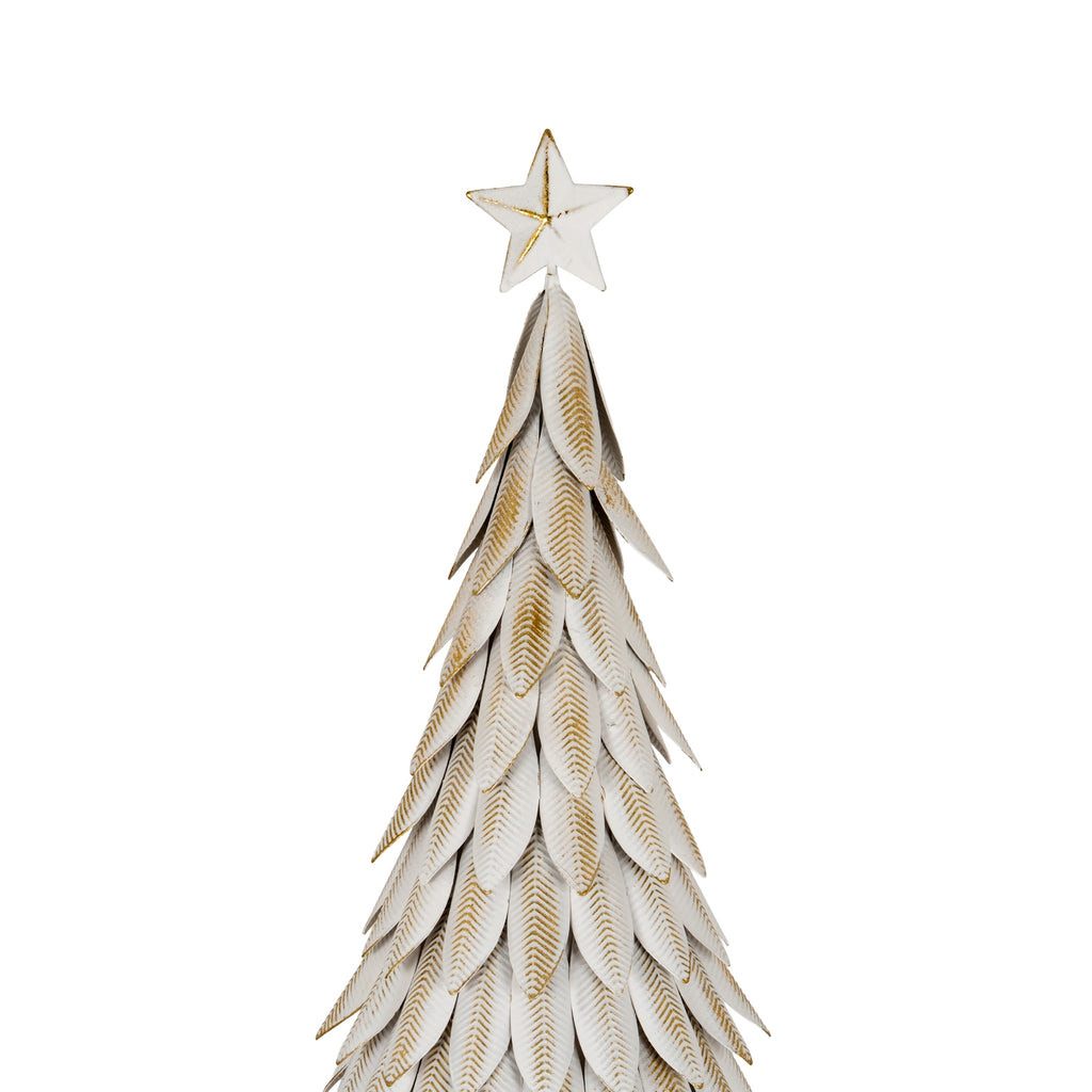 Close-up of the white star and overlapping leaf-like tree panels, showing gold-brown vein lines and the gaps between the layers.