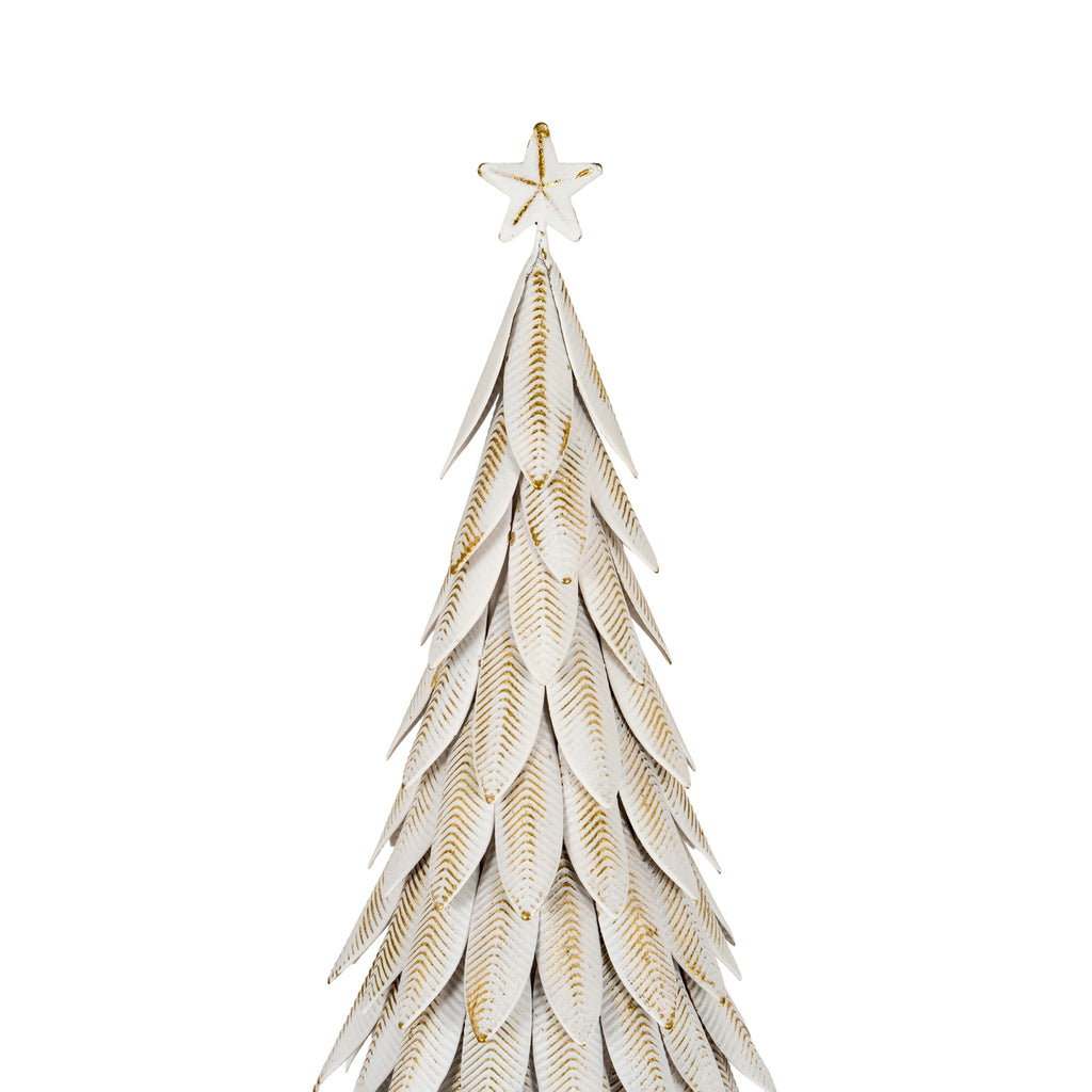 Close-up of the white star topper and layered leaf-shaped panels, showing gold-brown vein lines and edging.
