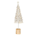 Full view of a white star-topped decorative tree with overlapping pointed panels, gold-brown vein marks and a cylindrical brown base.
