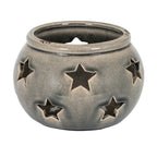 Rounded grey-beige candle lantern with star-shaped cut-outs, a crackle-patterned surface and an open top on a white background.