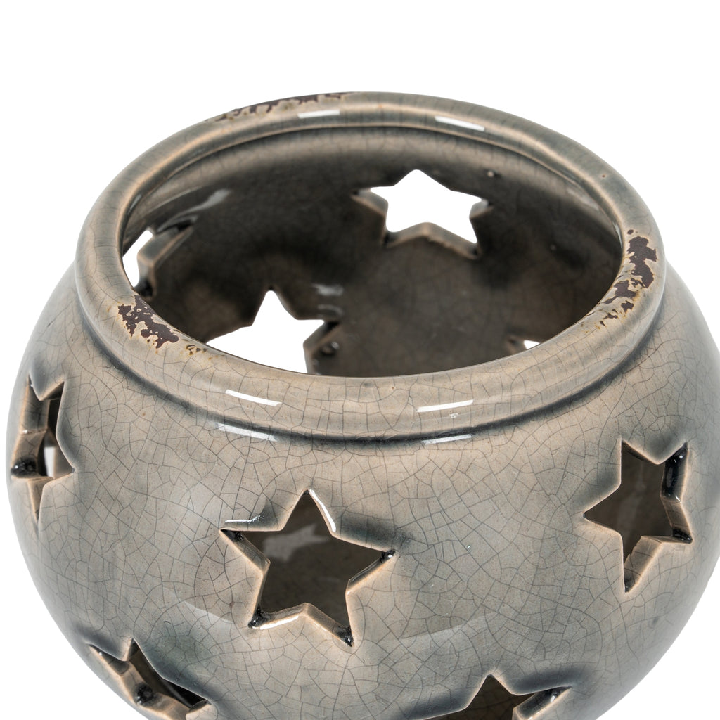 View from above of the star lantern showing its wide circular opening, rounded rim and dark interior.