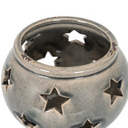 View from above of the star lantern showing its wide circular opening, rounded rim and dark interior.