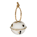 Close view of a white hanging bell with a knotted tan loop, star-shaped upper openings, a keyhole-shaped lower opening and a gold-brown accented central seam.