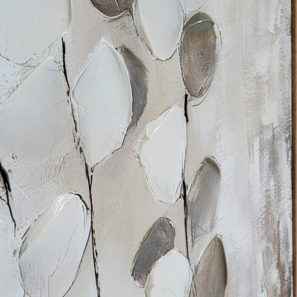 Close-up of raised pale leaf shapes, grey and taupe forms and fine dark stems across the textured canvas.