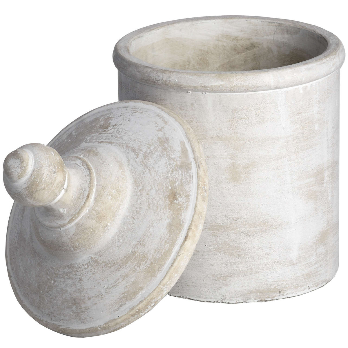 Open decorative canister with its domed lid leaning against the front, revealing a thick rounded rim and pale interior.