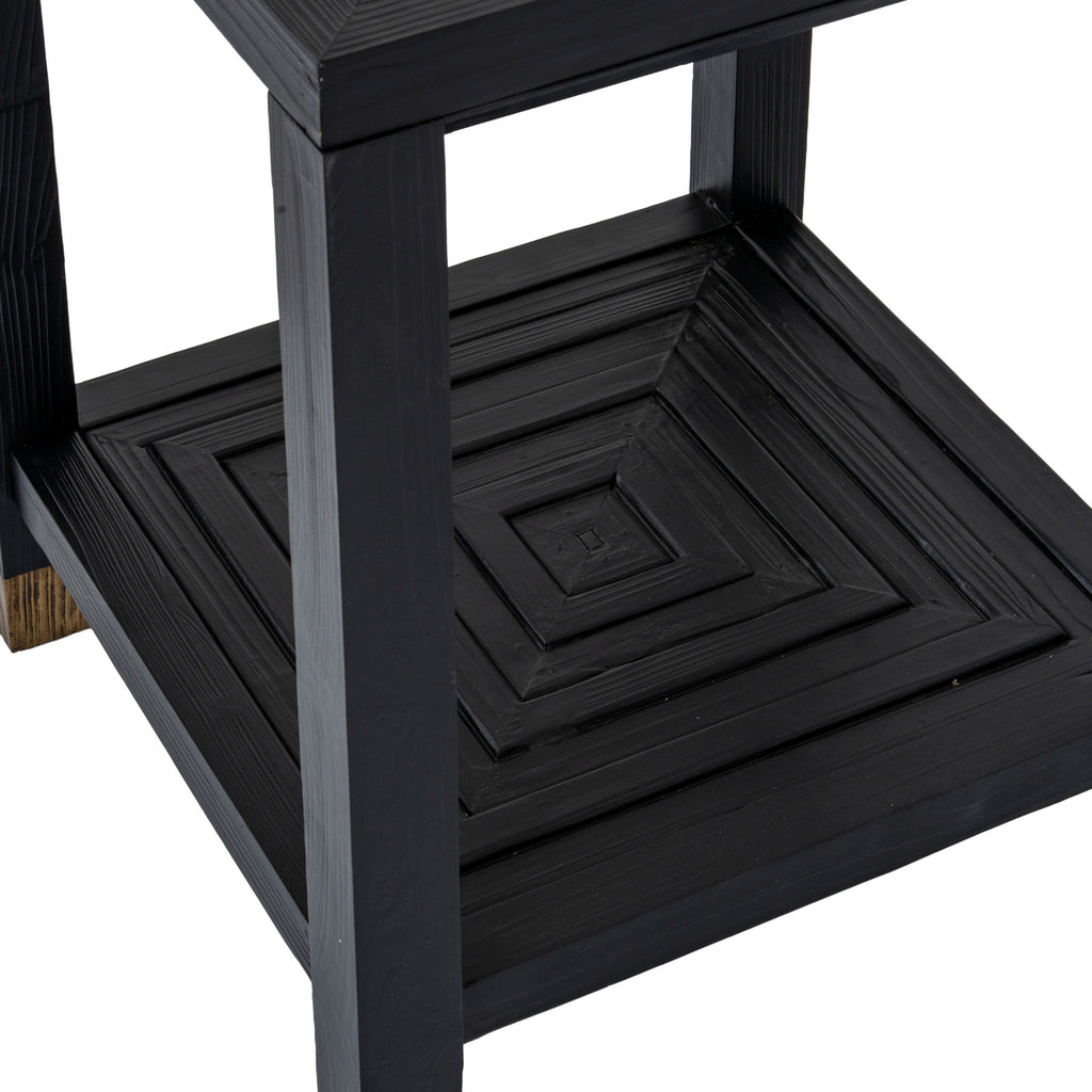 Close-up from above of the lower shelf with raised black strips forming nested squares between the table legs.