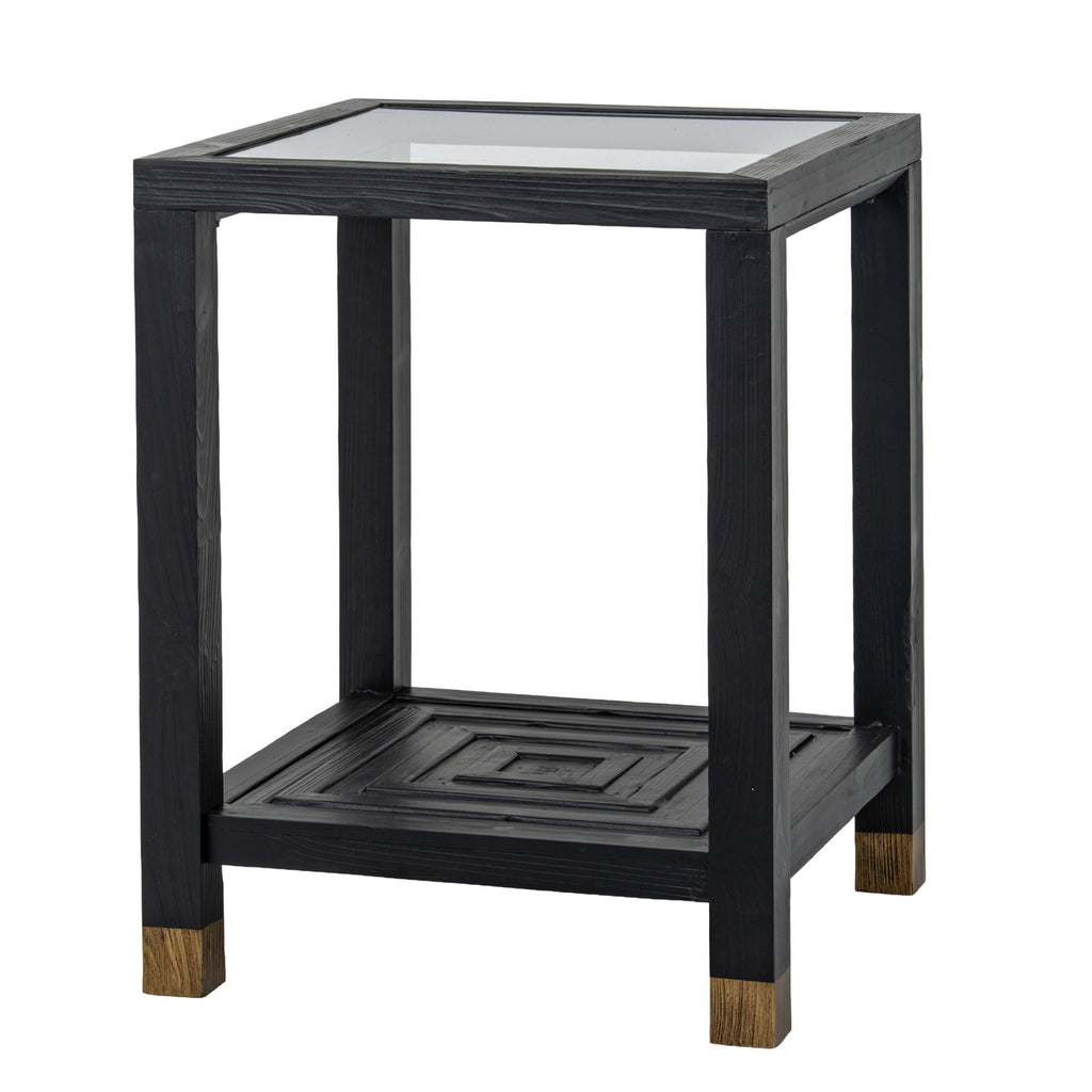 Angled view of the black Stepped Loop Side Table with a reflective square top, nested-square lower shelf and gold-toned leg ends.