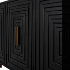 Close-up of the sideboard's black stepped relief and surface grain, with slim brass-toned handles beside the central door seam.