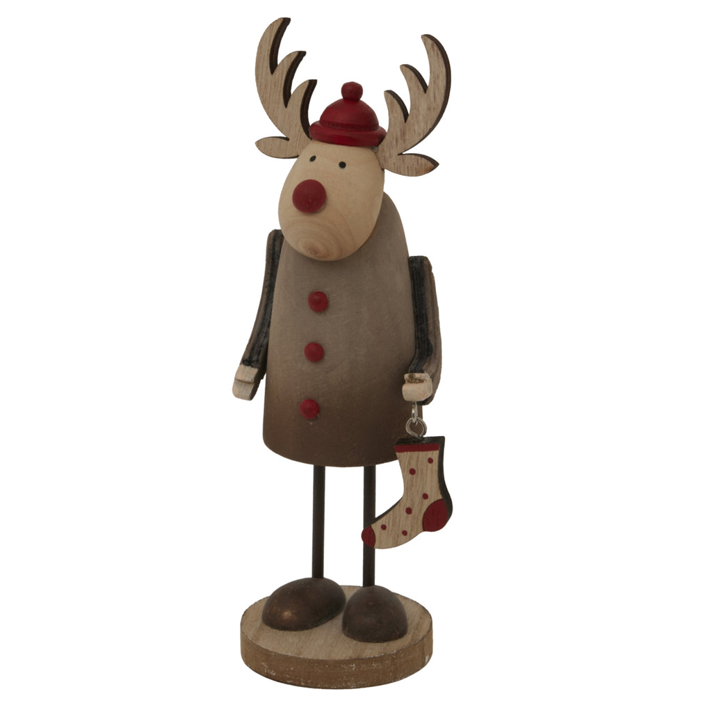 Angled view of the long-limbed reindeer decoration, showing dark-edged antlers, rounded feet and the red-spotted stocking hanging beside its body.