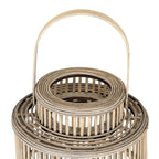 View down towards the lantern's open circular neck, showing concentric rim bands, vertical slats and the broad handle arch.