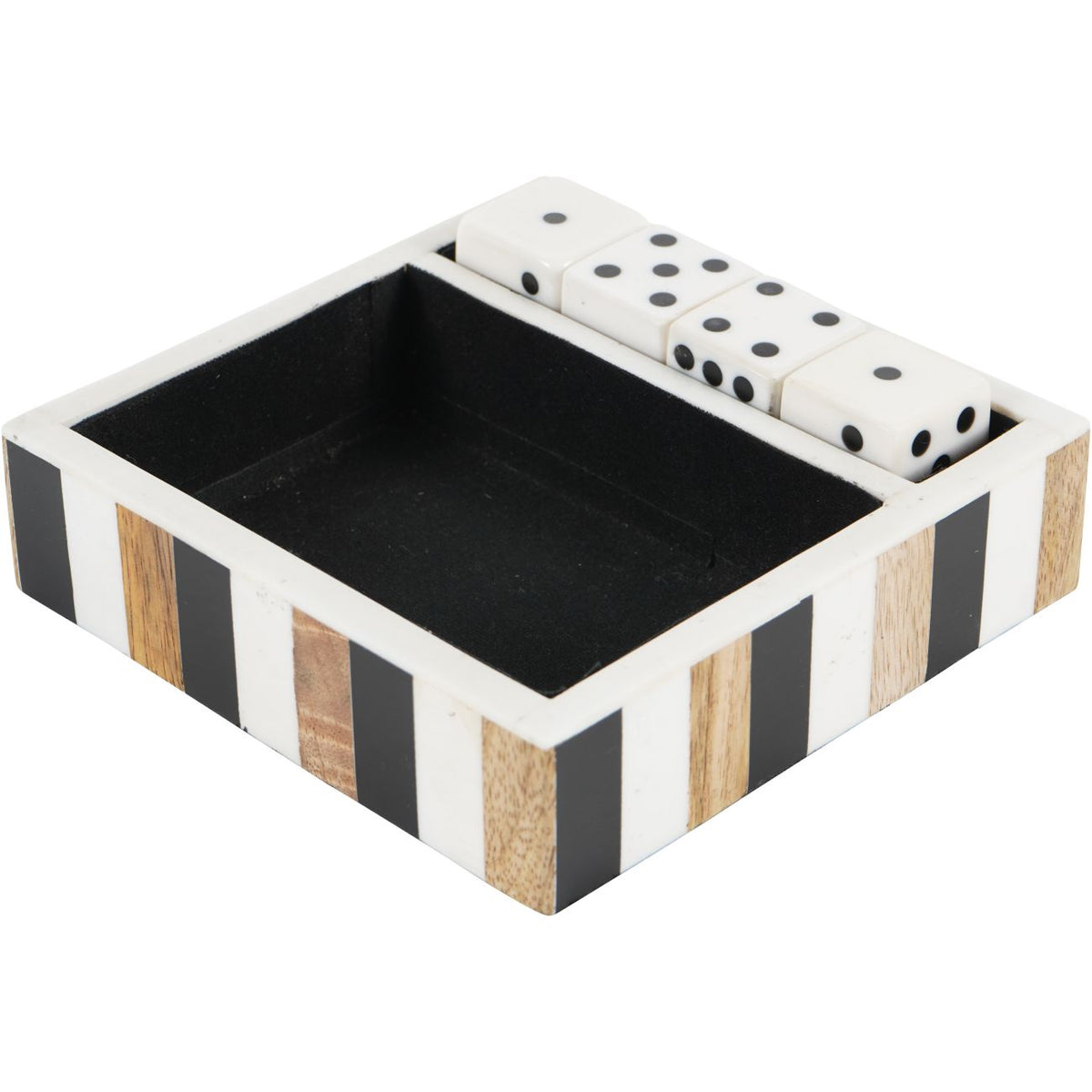 Angled view of a black, white and brown striped tray with a dark interior and four white dice in a narrow compartment.