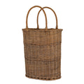Tall brown woven oval basket with an open top, two high curved handles and wrapped handle attachments, shown against a white background.