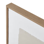 Close-up of the upper frame corner with its brown grain pattern beside the white border and rough edge of a cream panel.