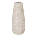 Tall pale cream vase with tan lines along irregular horizontal ribs, a tapered body and an open circular mouth against a white background.