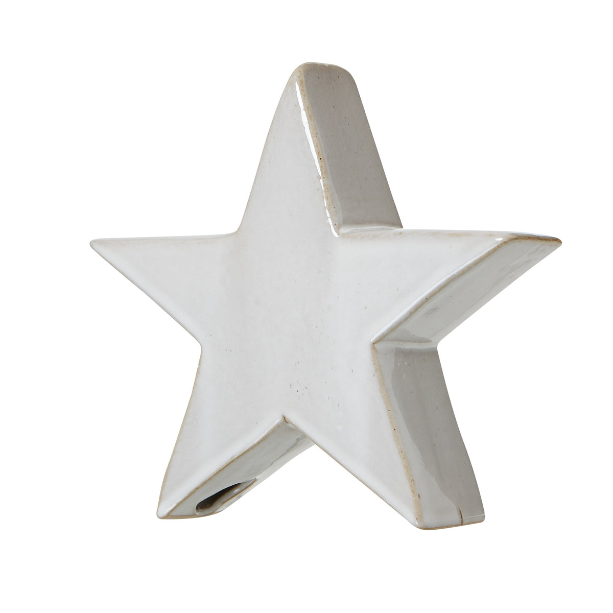 Angled view of the standing star showing its thick sides, fine speckles and tan edges against a white background.