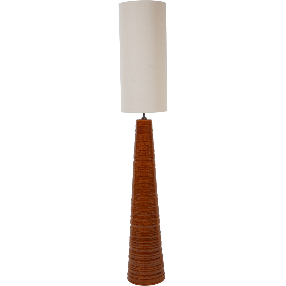 Full view of the terracotta floor lamp with a tapered ribbed base and tall ivory drum shade on white.