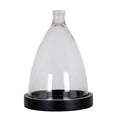 Empty transparent display cloche with a tall tapered cover and short rounded top grip on a black circular tray with a raised rim, against a white background.