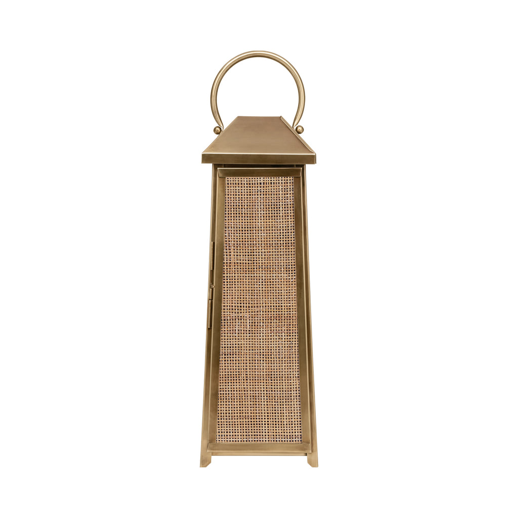 Front view of the tapered lantern with its woven rattan door closed beneath a sloping top and round handle.