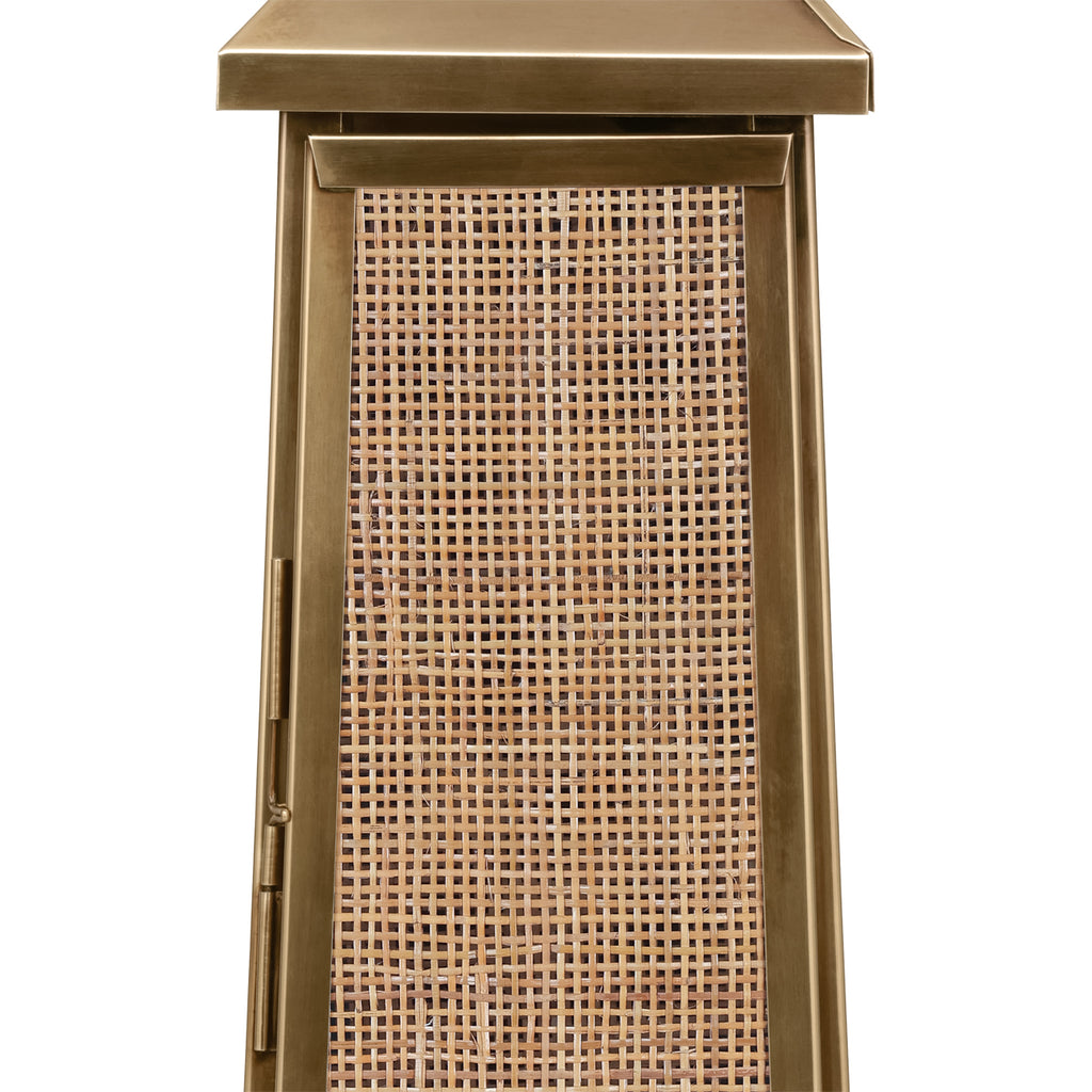 Close-up of the square rattan weave on the lantern door, bordered by an antique brass finish frame with hinges at the side.