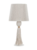 Unlit cream table lamp with a corded tapered shade, rounded wrapped stem and long tassel above a white circular foot.