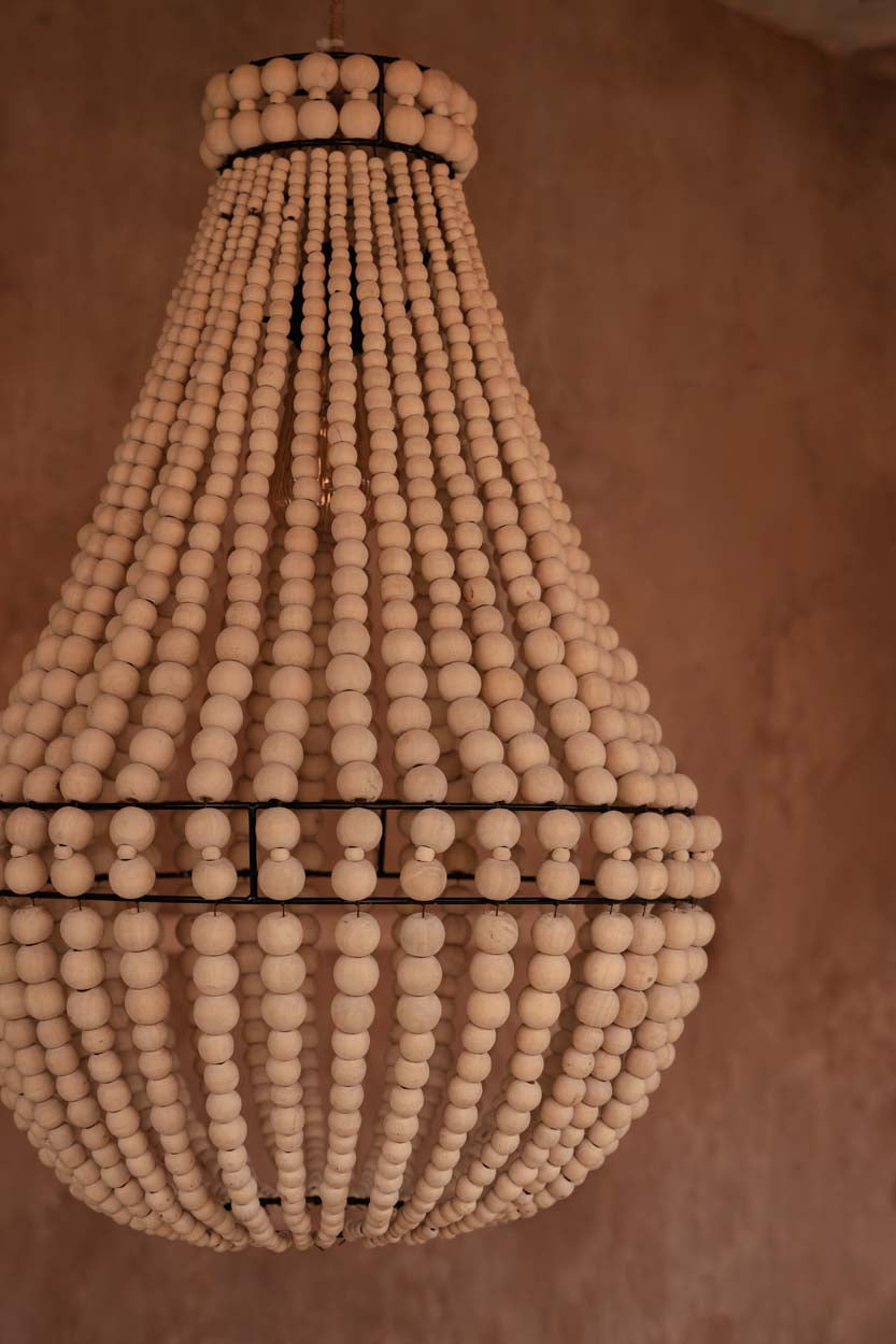 Teardrop Wooden Bead Chandelier – Natural, Medium — styled close view in a warm interior