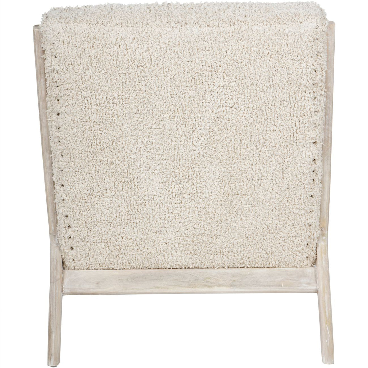 Rear view of the Teddy chair with a fully upholstered back bordered by pale wooden uprights.