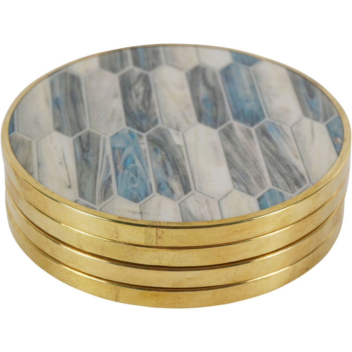 Four round Tessera coasters stacked, showing gold-toned edges and a blue, grey and ivory patterned face.