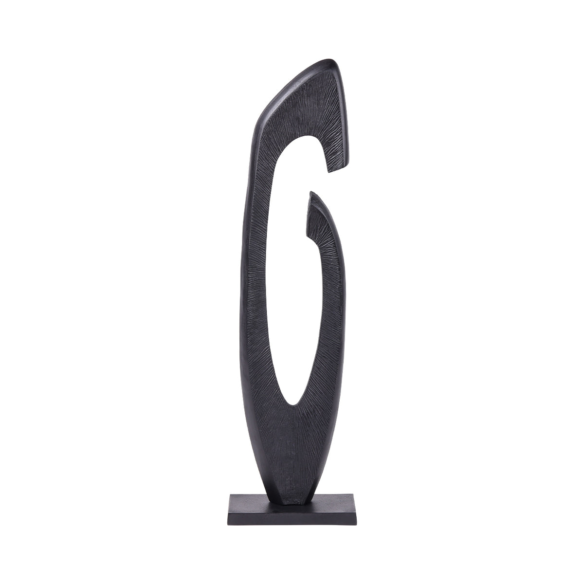 Front view of the tall black sculpture with fine grooves around an open centre and a gap beneath the hooked top.