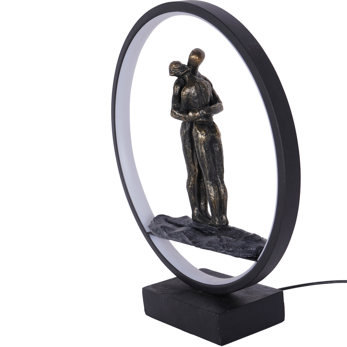 Angled view showing the depth of the black circular frame, white inner light band and embracing figures above a textured platform.