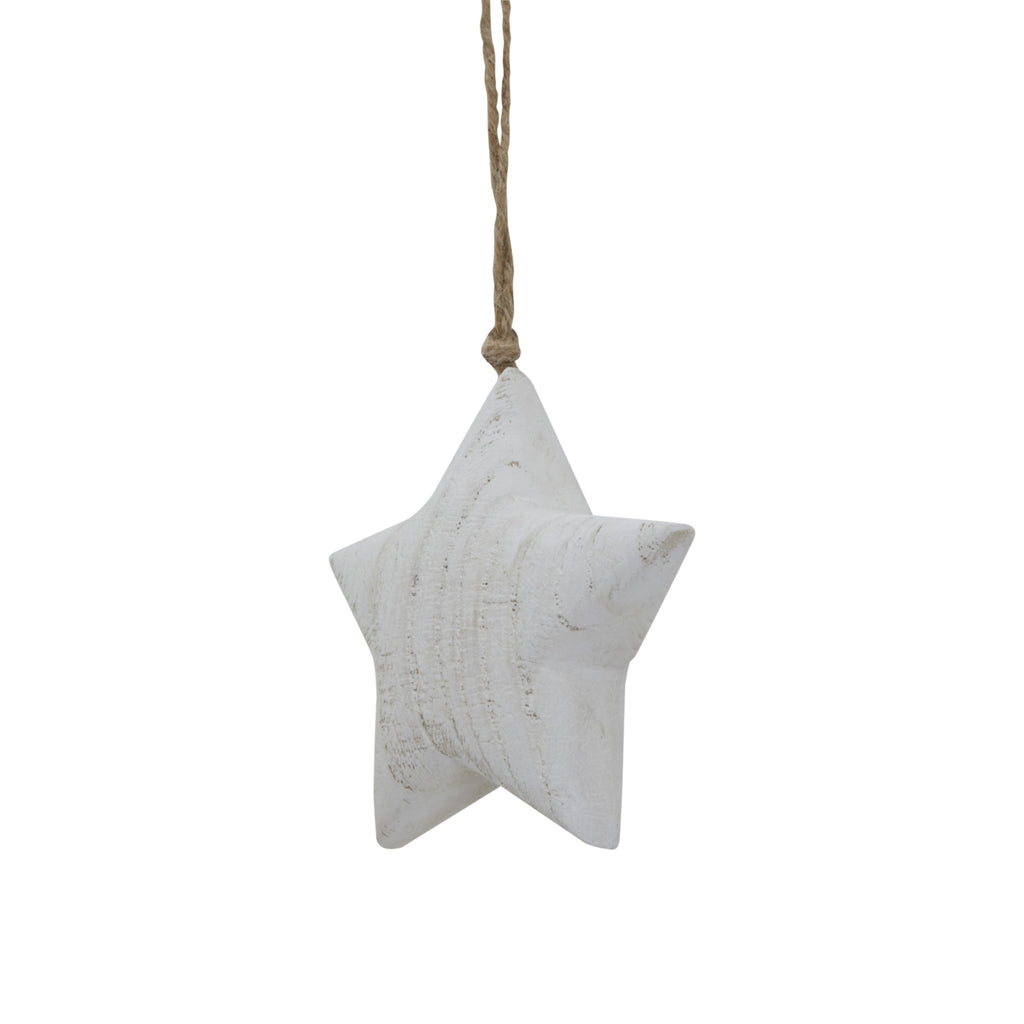 Close view of the whitewashed star's thick shaped face, rounded edges and darker surface markings, with a knotted cord above.