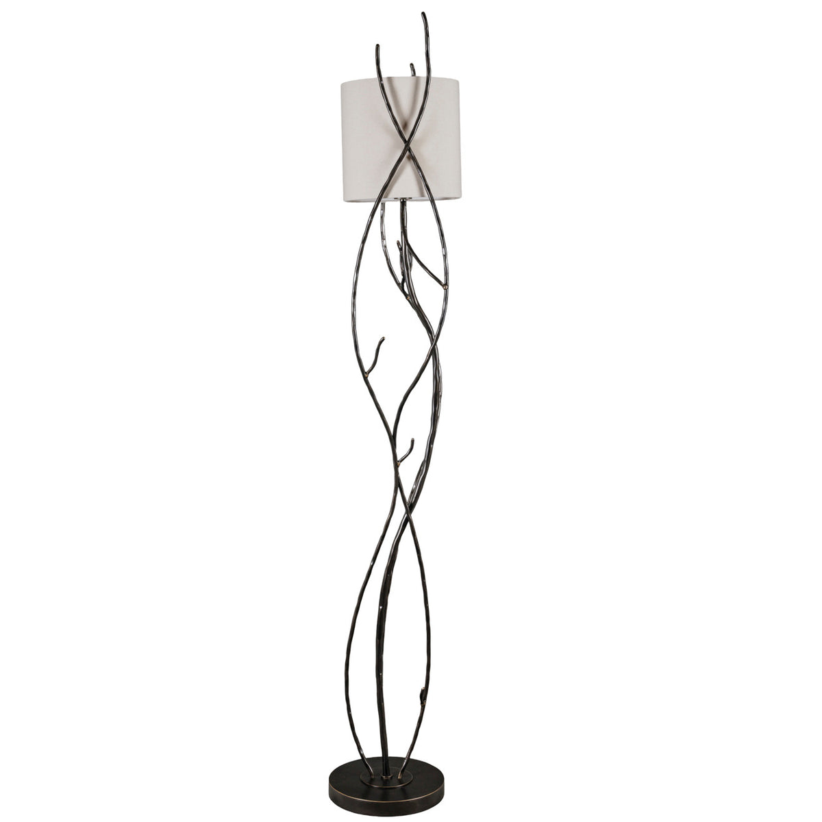 Alternate view of the floor lamp showing two long branches crossing in front of the pale shade and curving down to the circular base.