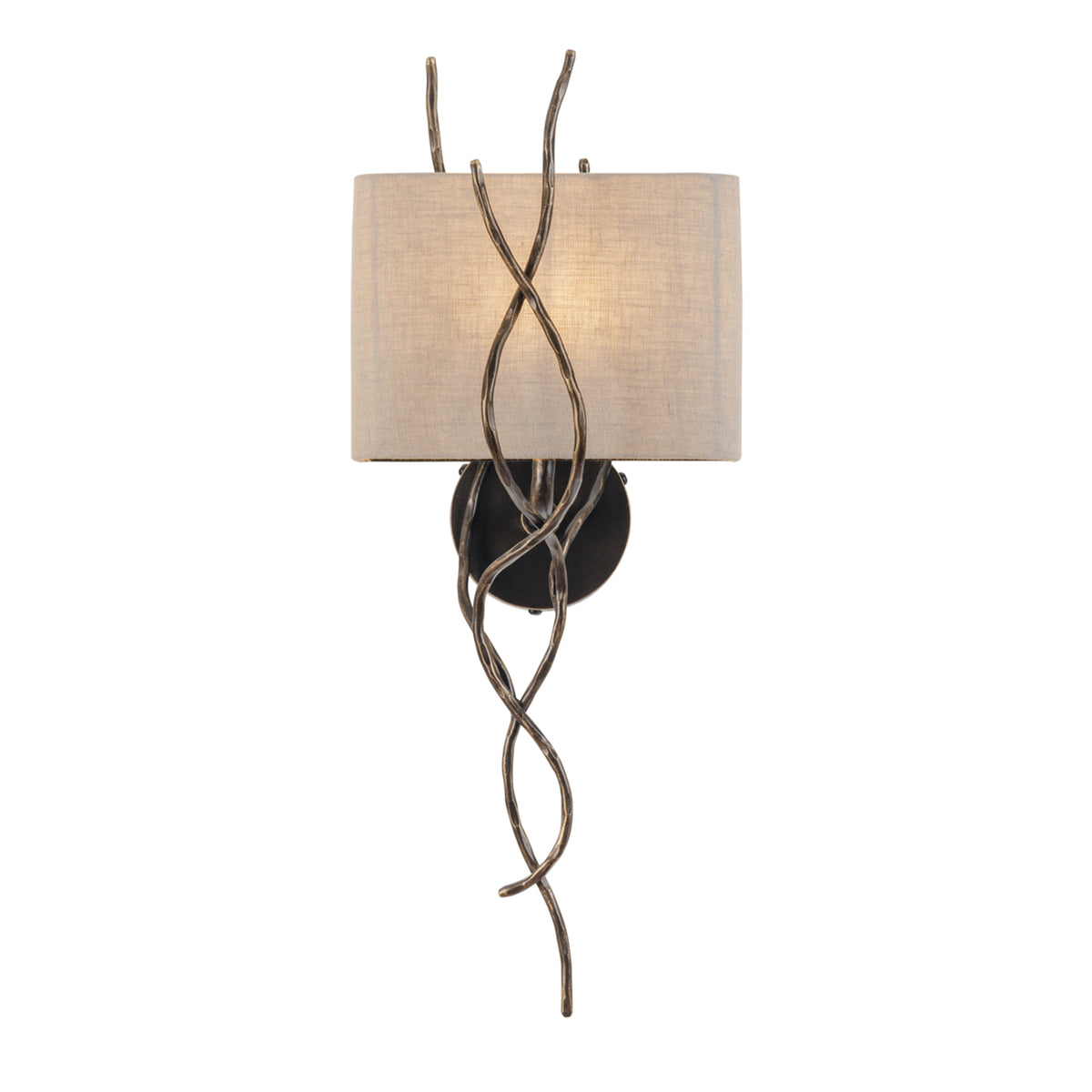 Front view of the illuminated wall light, with light glowing through the linen shade behind the crossing branches.