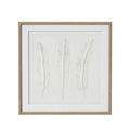Front view of square framed artwork with three pale feather forms on a textured white background, a wide white mount and beige beaded frame.