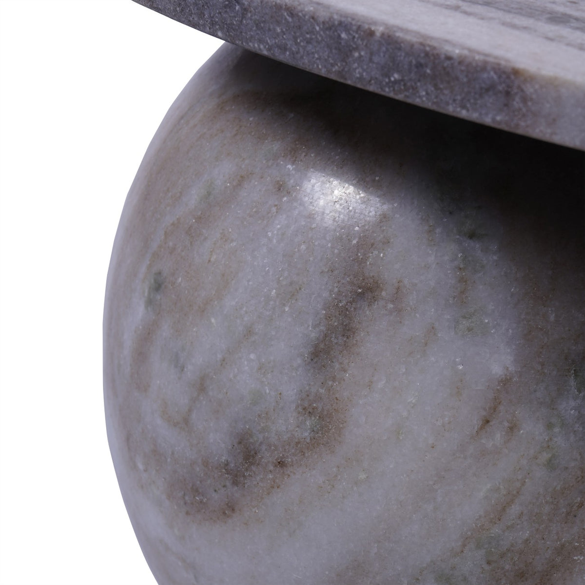 Detail of a polished spherical marble foot showing pale grey and brown markings beneath the tabletop.
