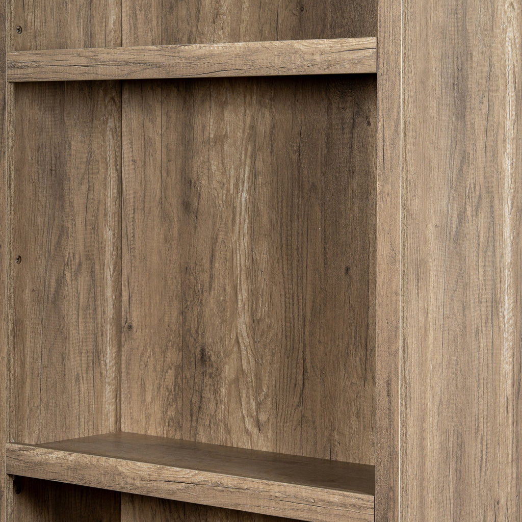 Close-up of a shelving bay and the right outer side, with pale streaks and dark grain lines across the brown surfaces.