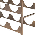 Close-up of the gold-toned metal bottle supports with curved cut-outs and open side bracing.
