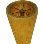 View into the lamp's open circular top, showing closely gathered amber bead strands around the rim and metal supports inside.