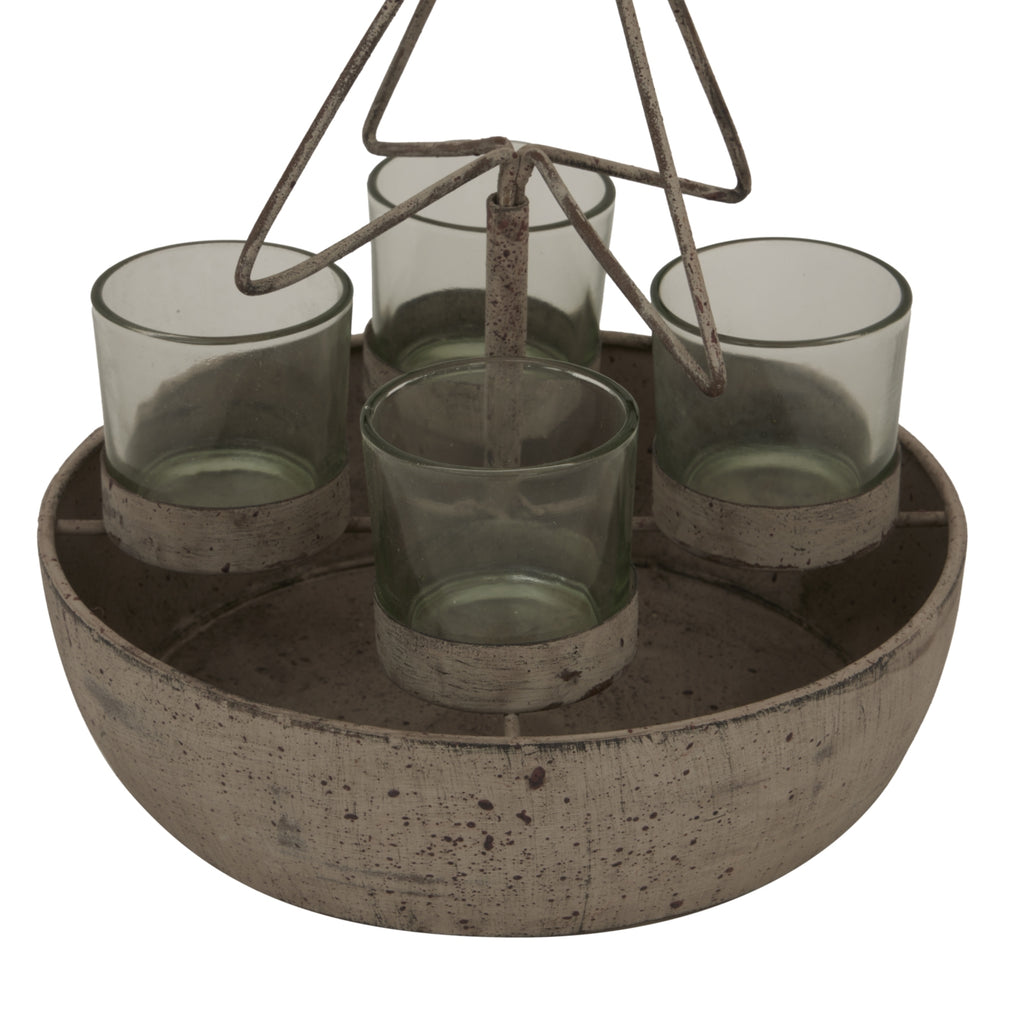 Close-up of four grey-green cups in pale speckled collars, with the lower tree outline above and the weathered round tray below.