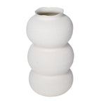 White triple curve vase viewed slightly from above, showing the opening and textured rounded body.