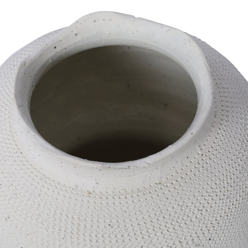 Close view into the vase opening, showing the undulating white rim and textured shoulder.