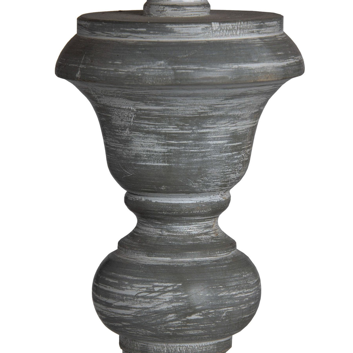 Close-up of the lamp's rounded grey profile, showing pale irregular streaks across the curved surface and raised edges.