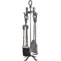 Grey fireplace tool set on four curved feet, with a black-bristled brush at the front and looped handles beneath a knot-shaped top.