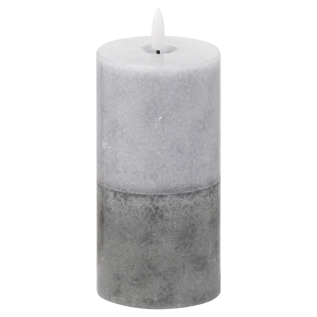 Grey cylindrical LED candle on a white background, showing pale mottling above a darker grey lower section and a white flame-shaped element.