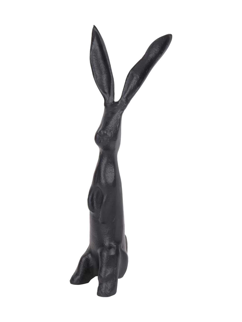 Angled side view of the black hare sculpture showing its projecting muzzle, long ears and rounded hindquarters.