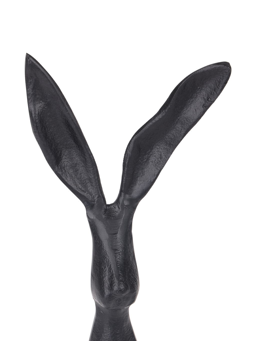Close-up of the hare sculpture's head and two long ears, showing the textured black surface.