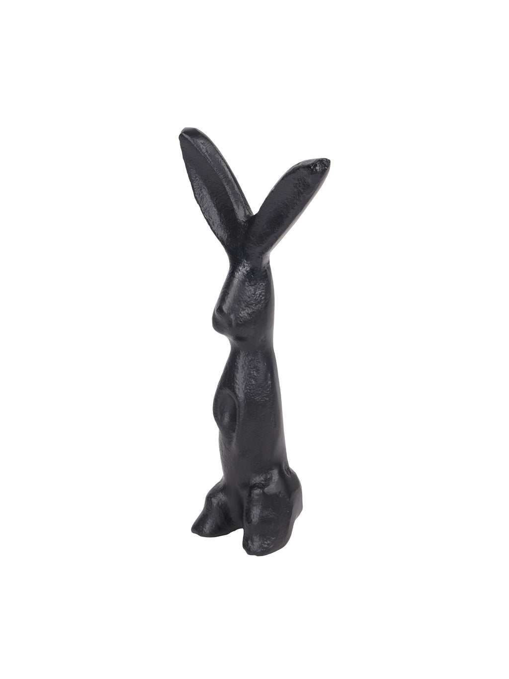 Angled view of the black hare sculpture showing its projecting muzzle, forepaws and textured surface.