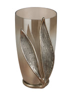 Angled view of the leaf vase showing the open rim and tall gold leaf extending above it.